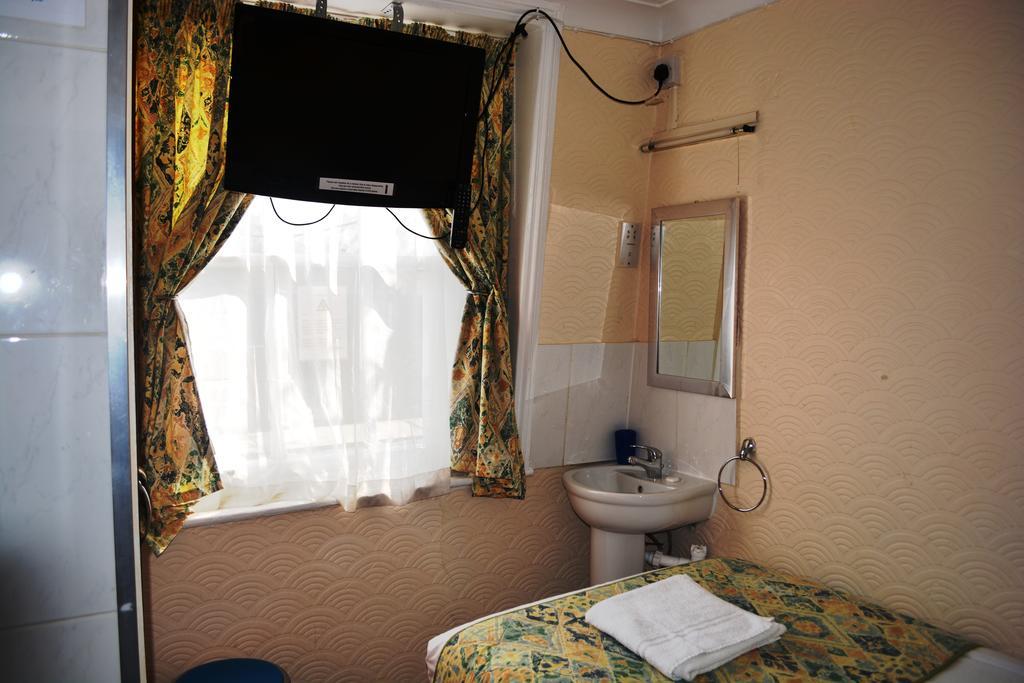 Falcon Hotel London Rum bild