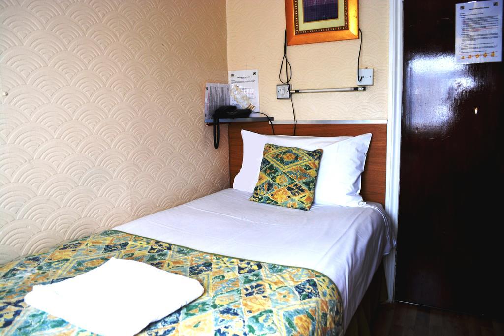 Falcon Hotel London Rum bild