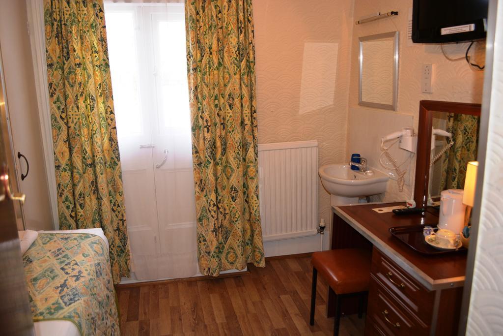Falcon Hotel London Rum bild