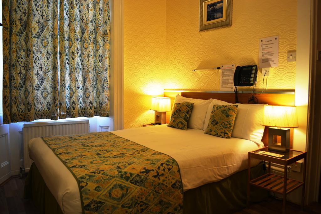 Falcon Hotel London Rum bild