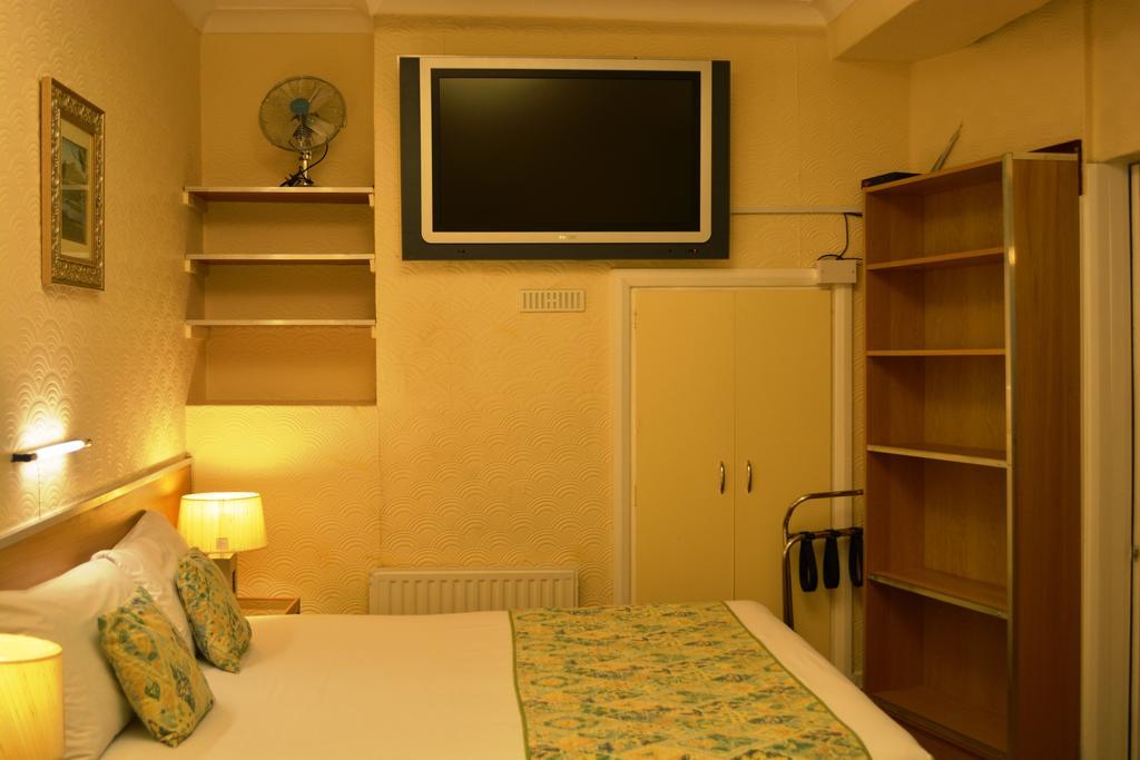Falcon Hotel London Rum bild